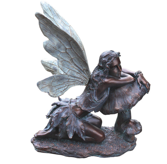 Brnz fairy on mushroom